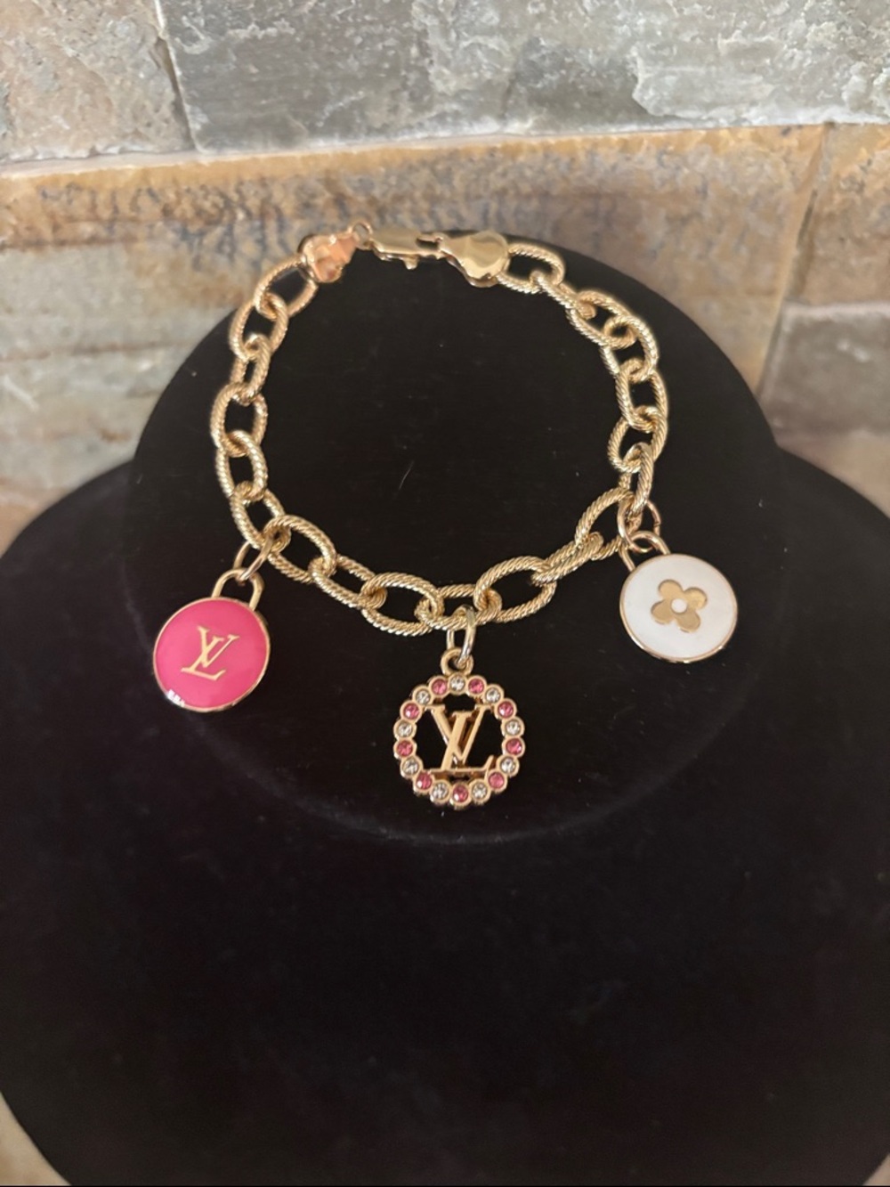 Gold Tone Charm Bracelet with LV Pink and White Enamel Accents